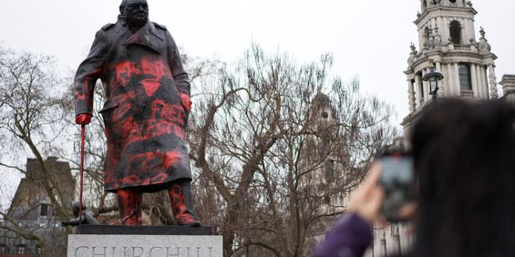 Churchill statue in London defaced with anti-Israel messages